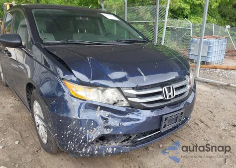 2014 Honda Odyssey Lx z USA, uszkodzony, nr VIN 5FNRL5H21EB082119